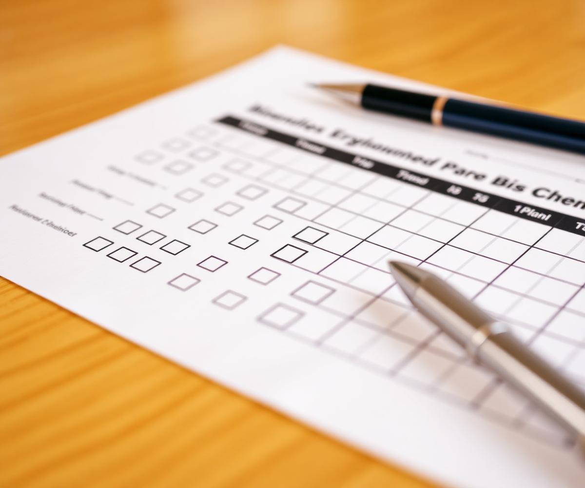 Interview scorecard notes on a desk during a hiring panel